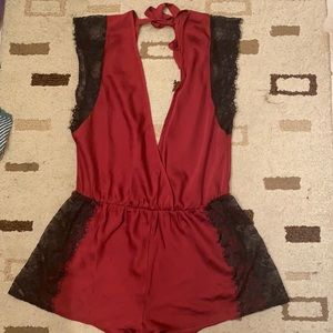 Low cut, no back, red lingerie with lace detailing